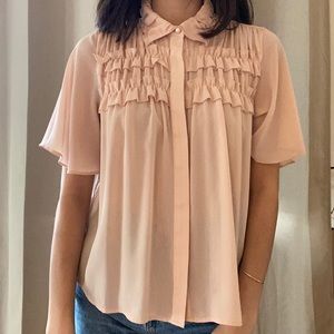 blush pink blouse